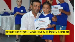 KATILIM BELGELERİNİ BAŞKAN YARDIMCISI ŞAHİNOĞLU’NUN ELİNDEN ALDILAR