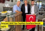 Pazaryeri MHP İlçe Teşkilatı Esnaflara Bayrak Dağıttı